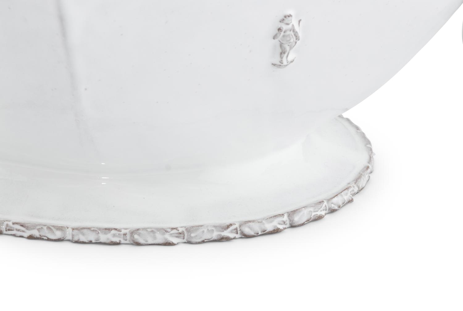 A Continental White-Glazed Faience Tureen