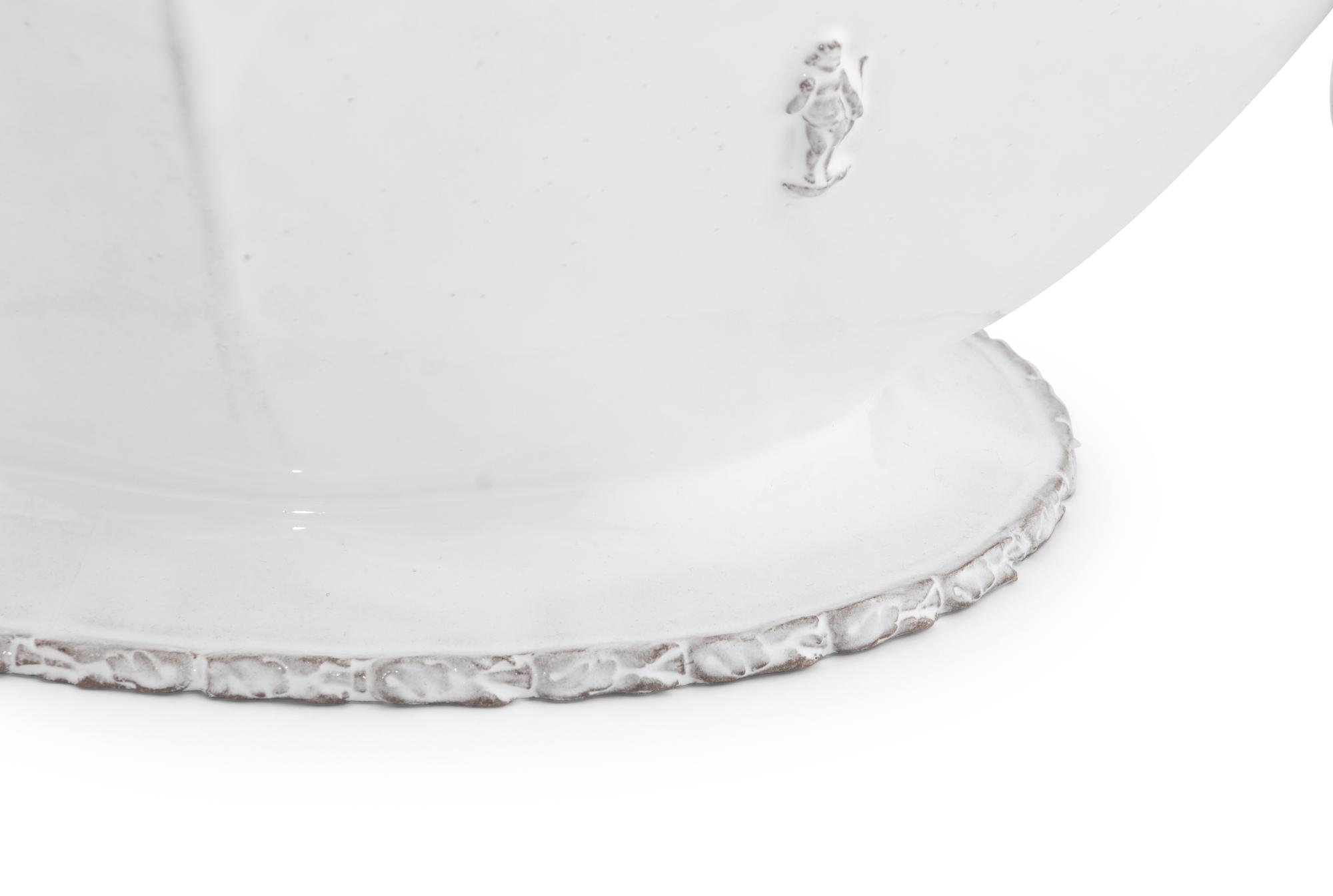 A Continental White-Glazed Faience Tureen
