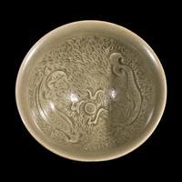 A Small Chinese Yaozhou-Style Celadon Glazed 'Dragon Fish' Bowl, Possibly Northern Song Dynasty 或為北宋 耀州窯模印雙魚碗