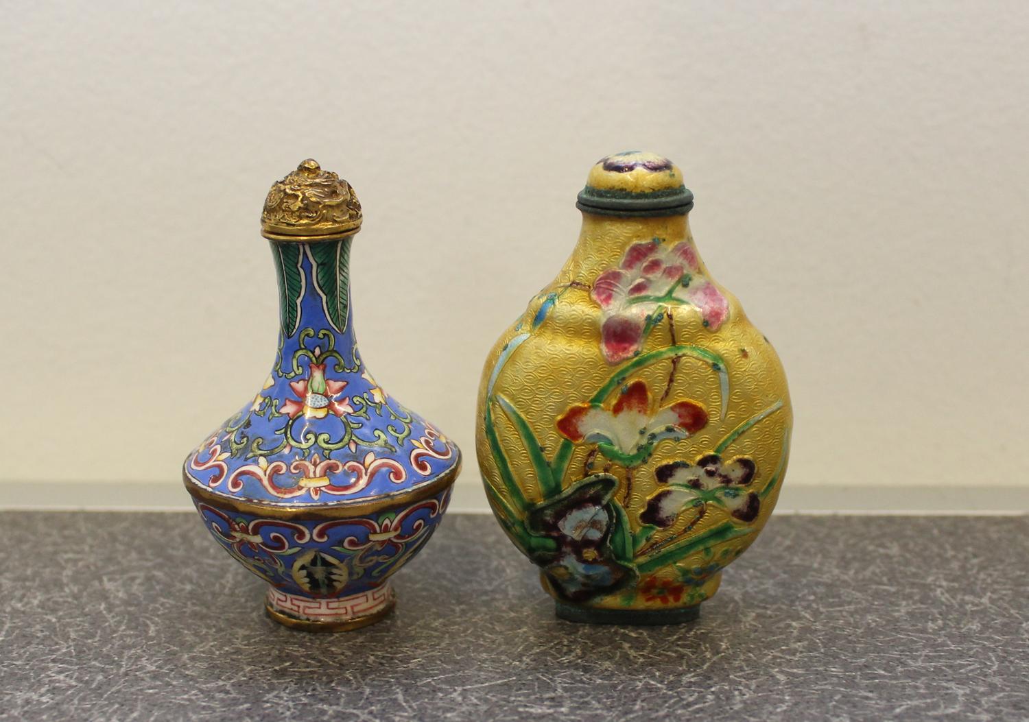 Two Enamel on Metal Snuff Bottles Height of taller 2 1/2 inches.
