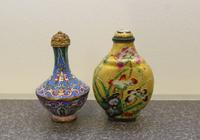 Two Enamel on Metal Snuff Bottles Height of taller 2 1/2 inches.