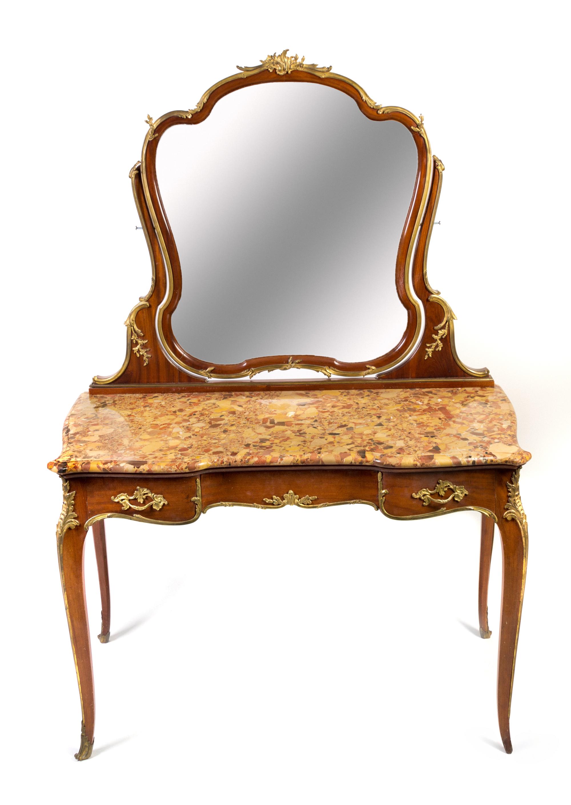 A Louis XV Style Gilt Bronze Mounted Mahogany Dressing Table Height 68 x width 47 3/8 x depth 24 inches. — FRANCOIS LINKE, EARLY 20TH CENTURY