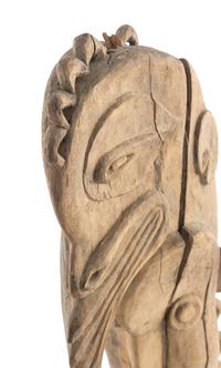 An African Wooden Figure with Bird Headdress