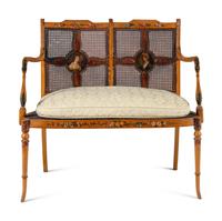 An Edwardian Painted Satinwood Settee