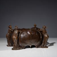 An Art Nouveau Figural Footed Jardinière