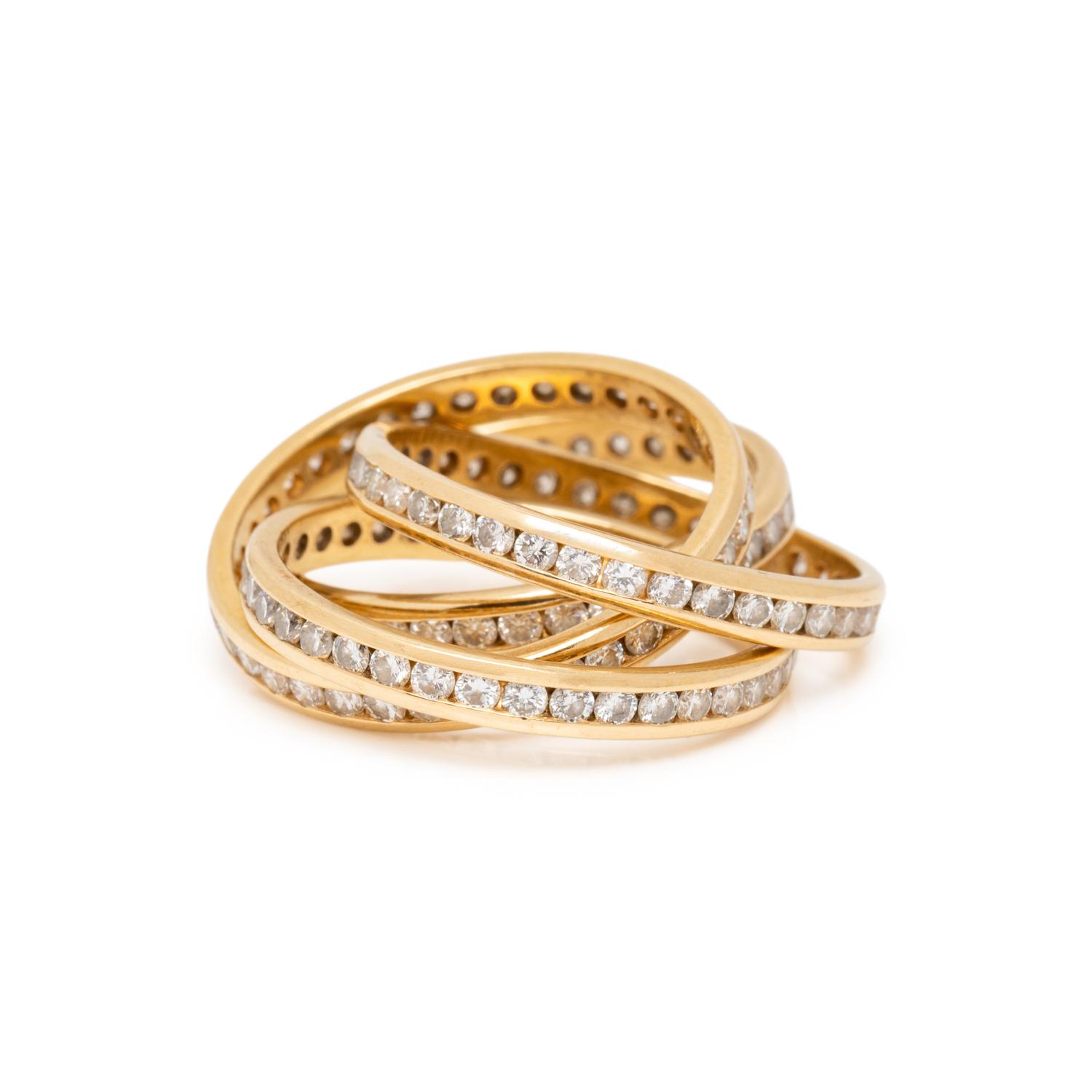 FRENCH, YELLOW GOLD AND DIAMOND ROLLING RING