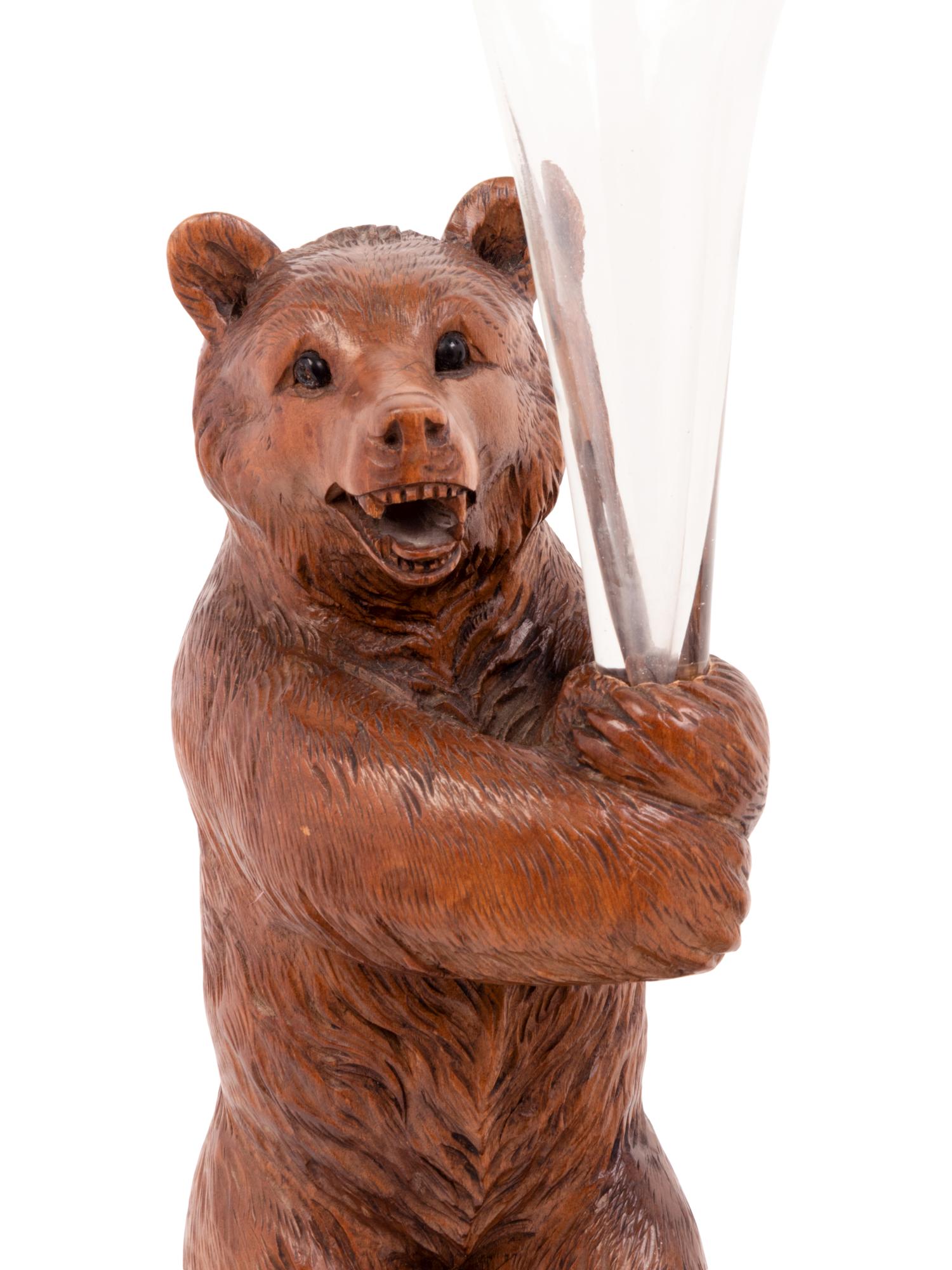 A Pair of Black Forest Style Carved Wood Bear-Form Trumpet Vases