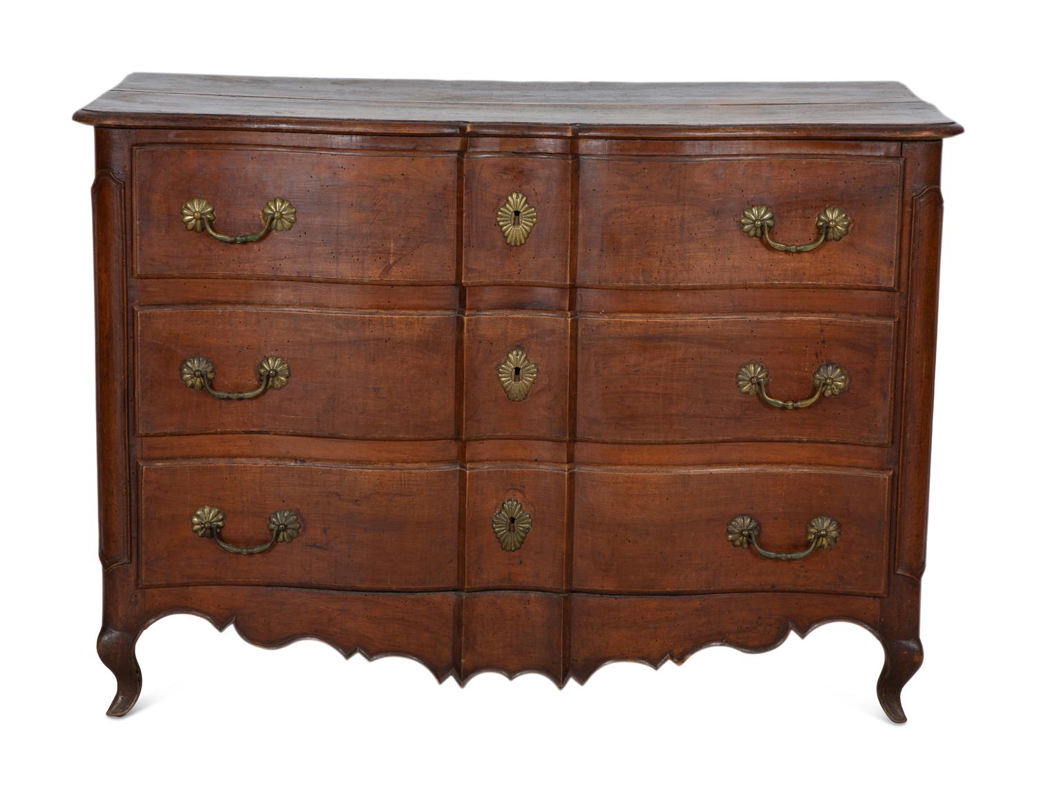 A French Provincial Carved Walnut Commode