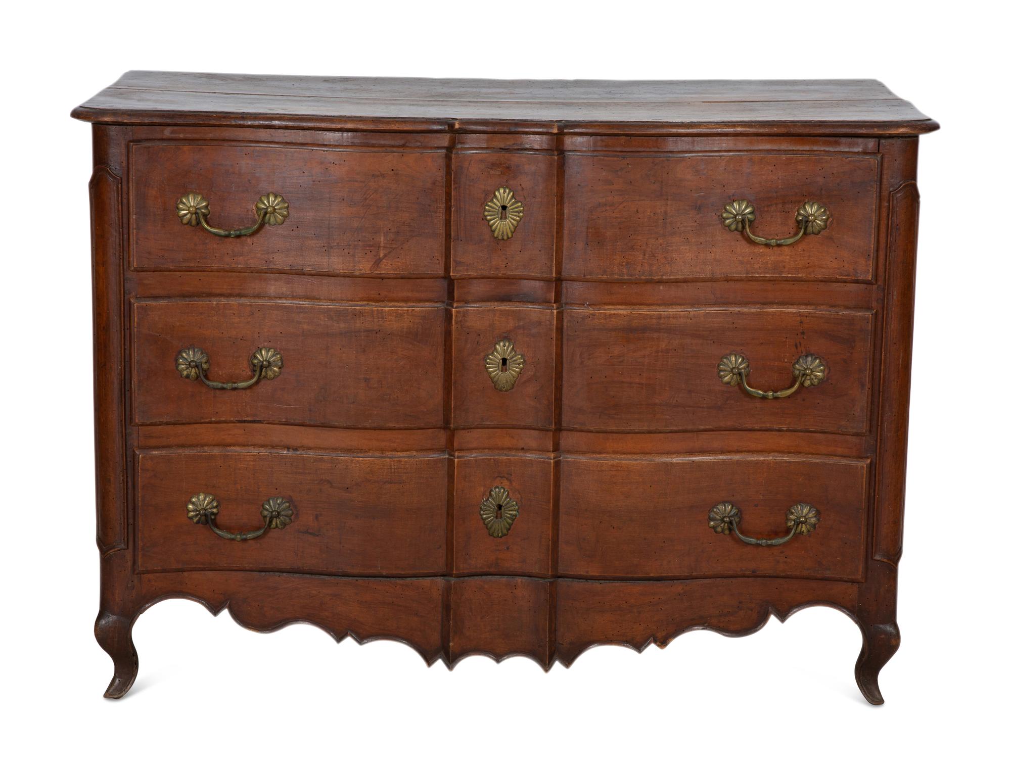 A French Provincial Carved Walnut Commode