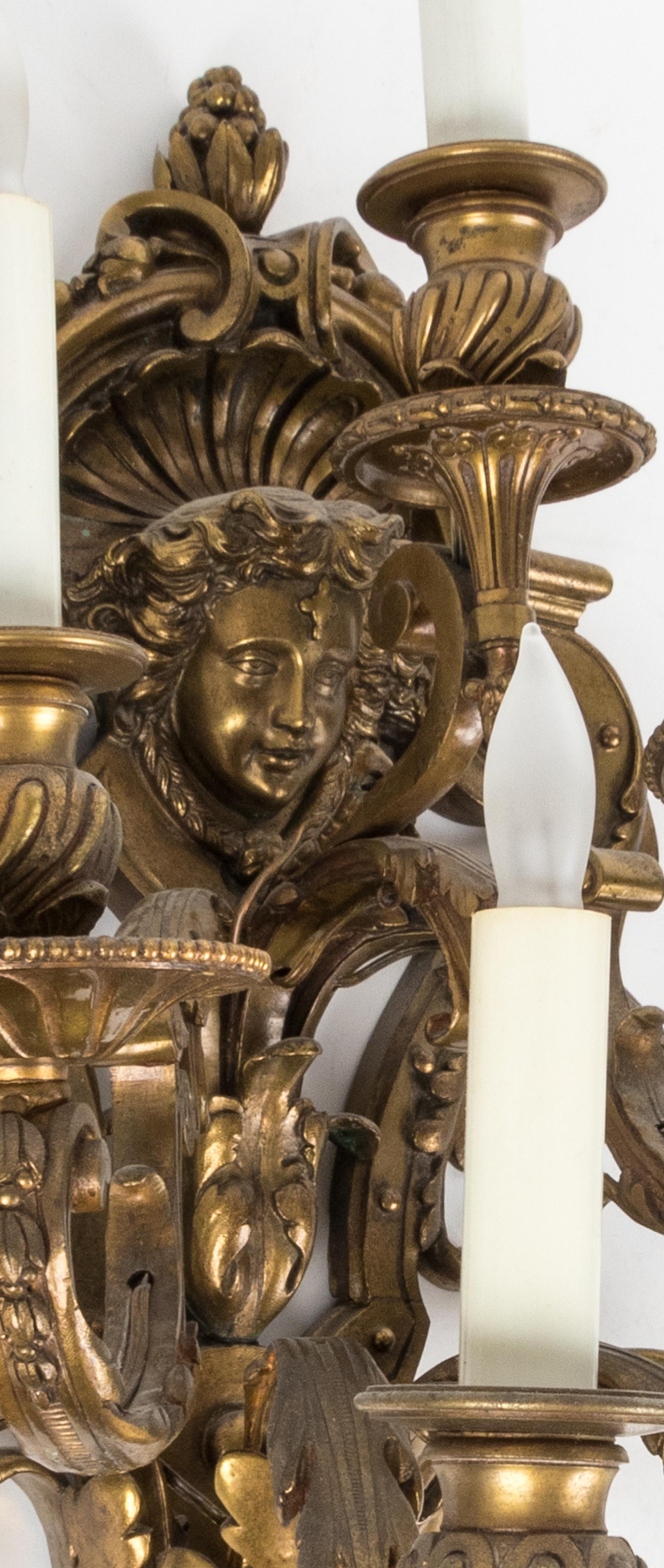 A Pair of Neoclassical Gilt Bronze Eight-Light Sconces