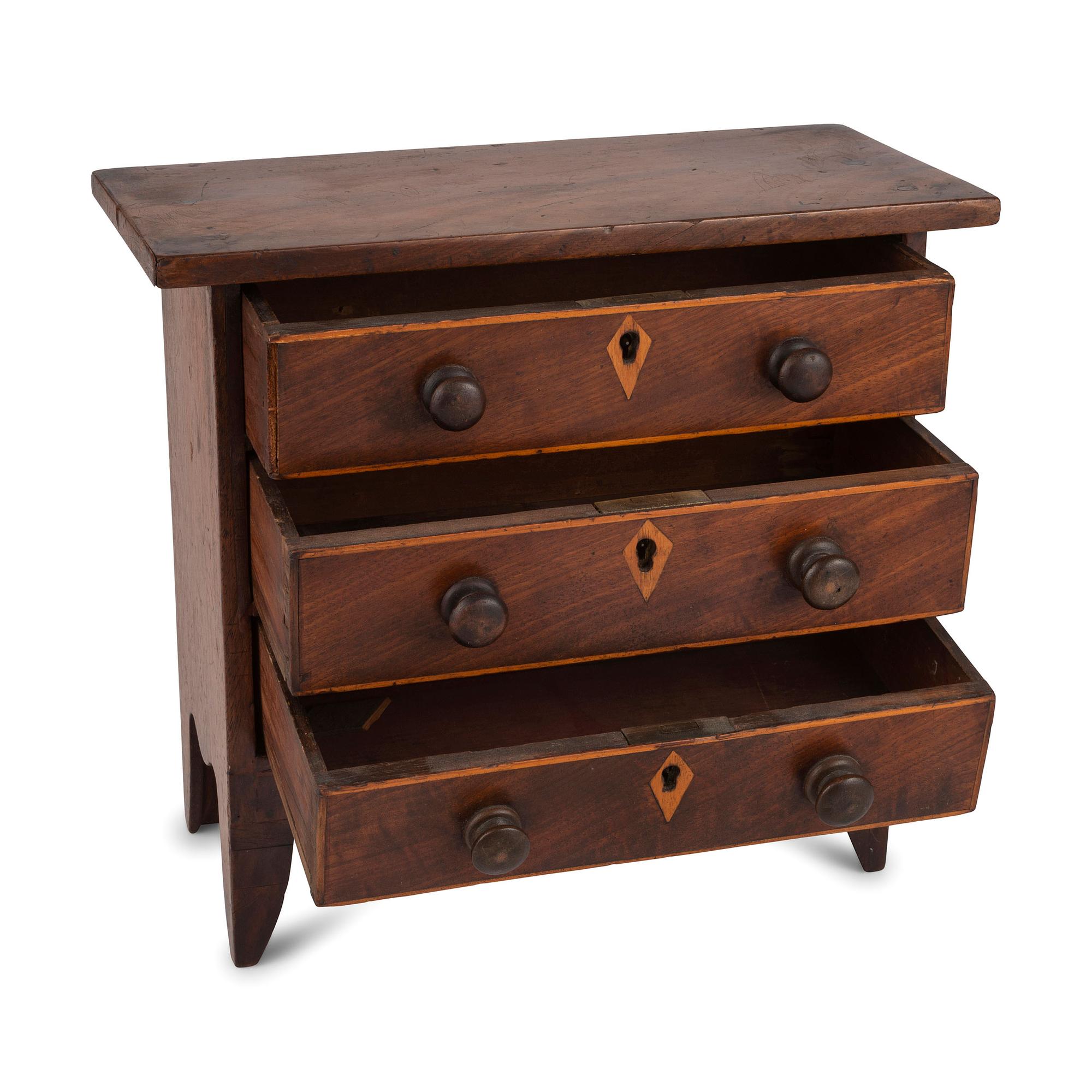 A Federal Inlaid and Carved Cherrywood Diminutive Chest of Drawers