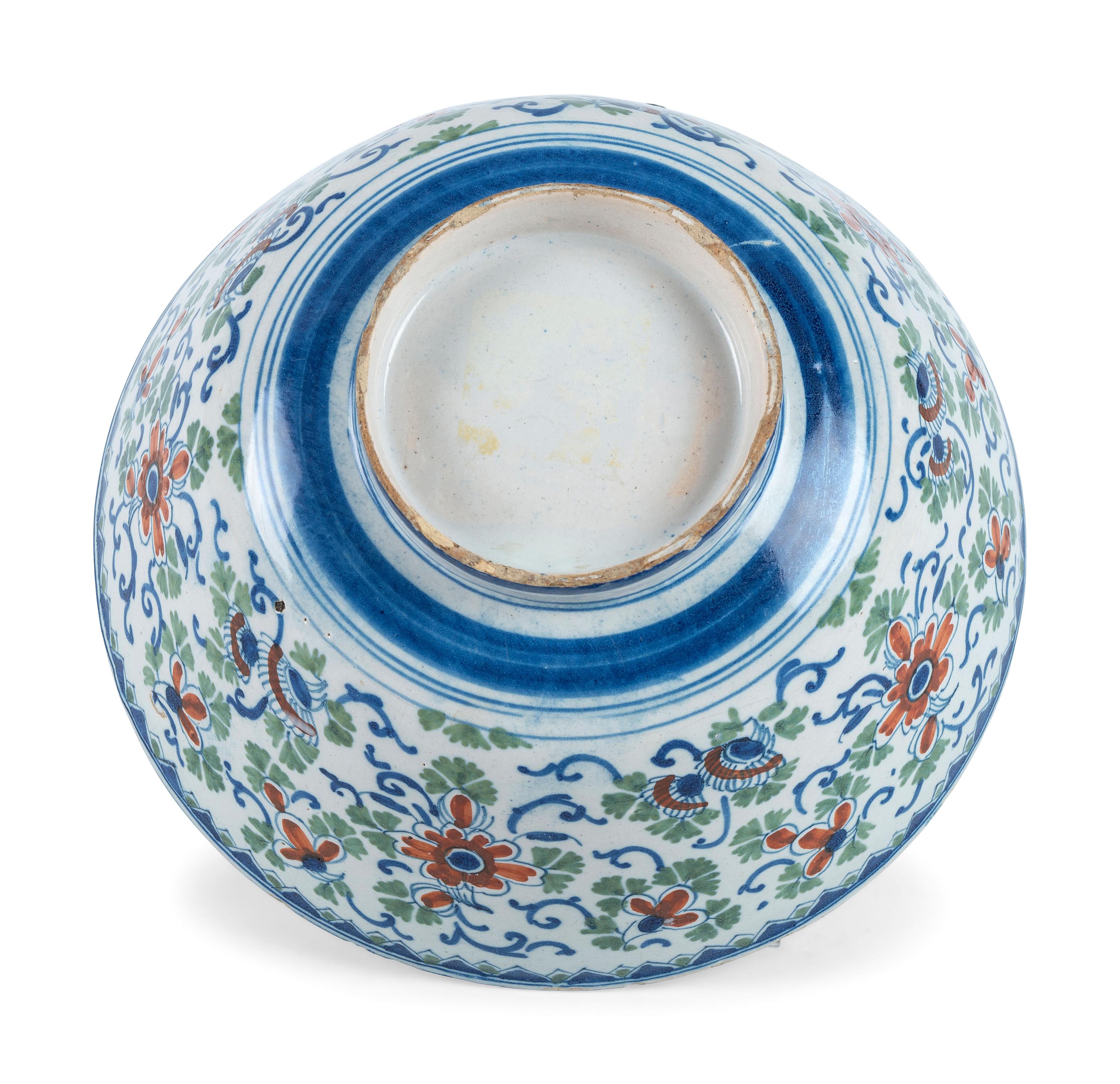 A Dutch Delft Polychrome Glazed Earthenware Punch Bowl