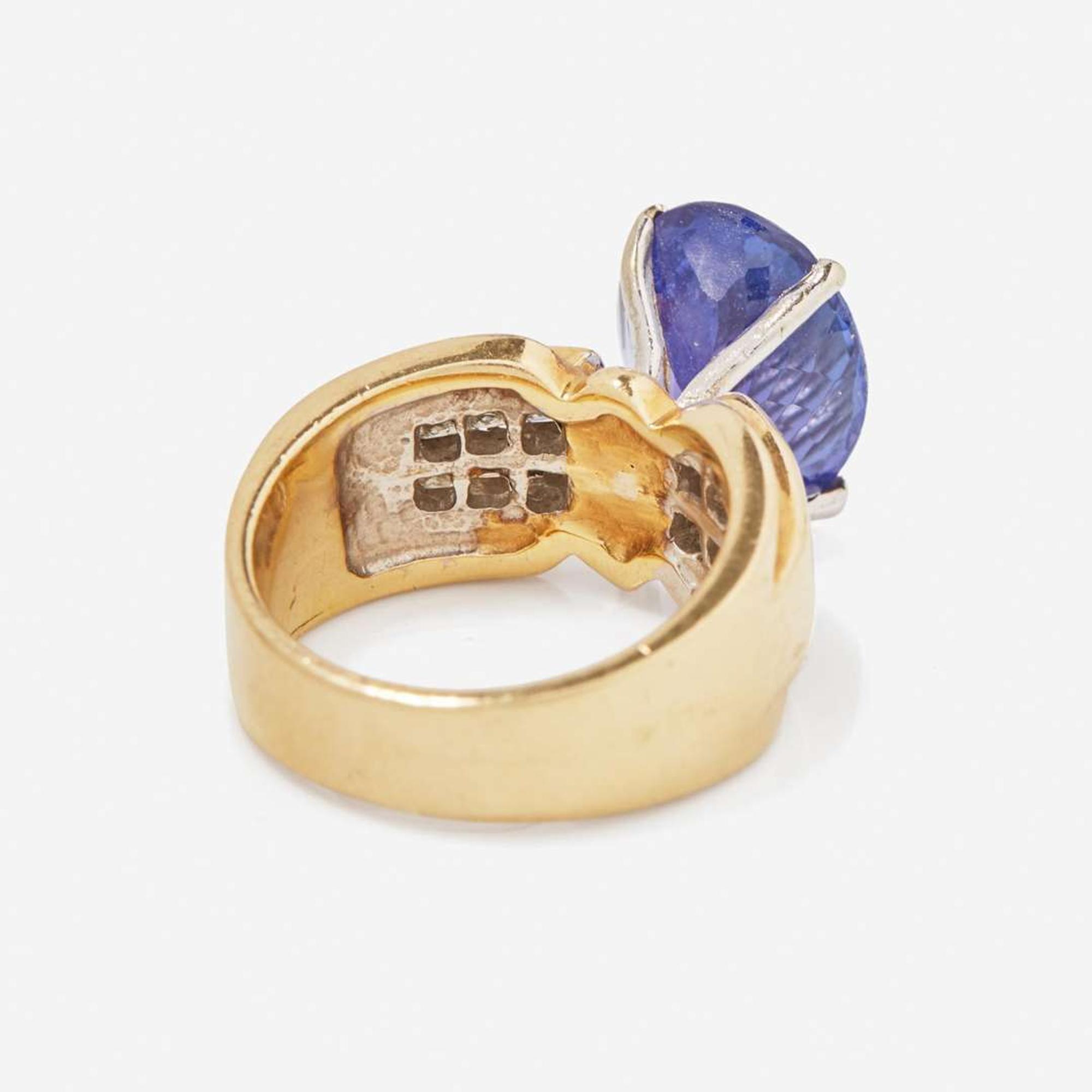 A 14K Yellow Gold, Tanzanite, and Diamond Ring