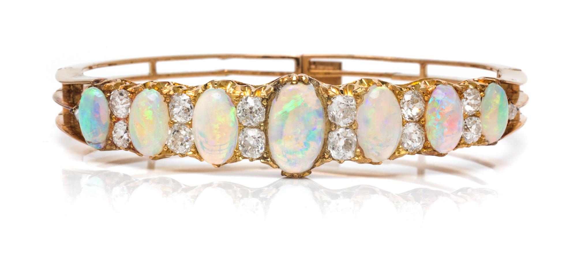 A Victorian Yellow Gold, Opal and Diamond Bangle Bracelet, 13.90 dwts.