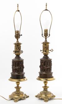 A Pair of Gilt and Patinated Metal Oil Lamp Bases Height overall 29 1/2 inches. — 20TH CENTURY