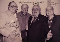 [SCIENCE FICTION]. Signed photograph of Forrest J. Ackerman, Ray Bradbury, Ray Harryhausen, and Julius Schwartz. Ca. 2001.