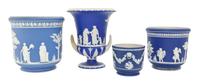 A Group of Four Jasperware Jardinieres, Height of first 10 1/4 inches.