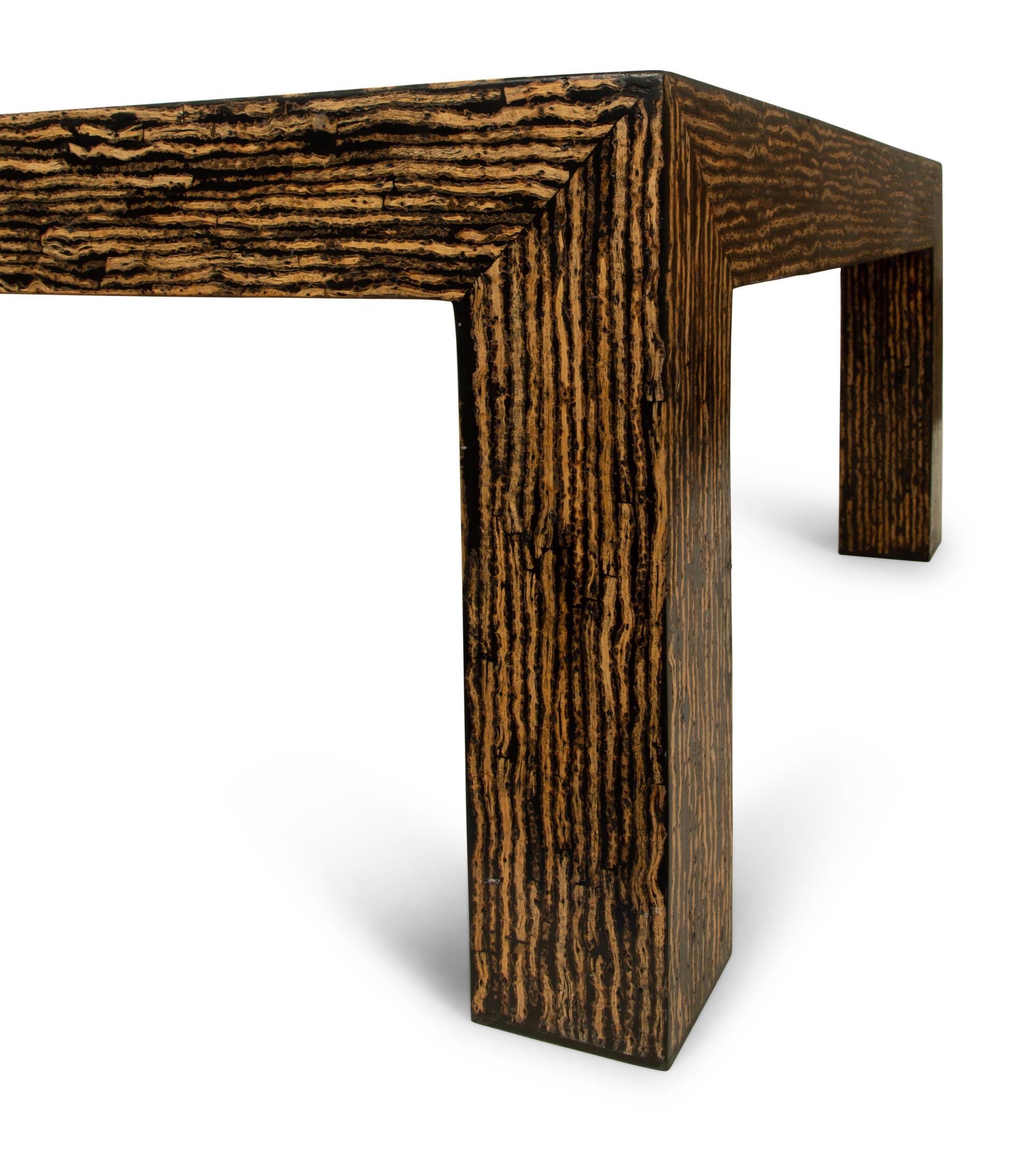 A Contemporary Palmwood-Veneered Cocktail Table
