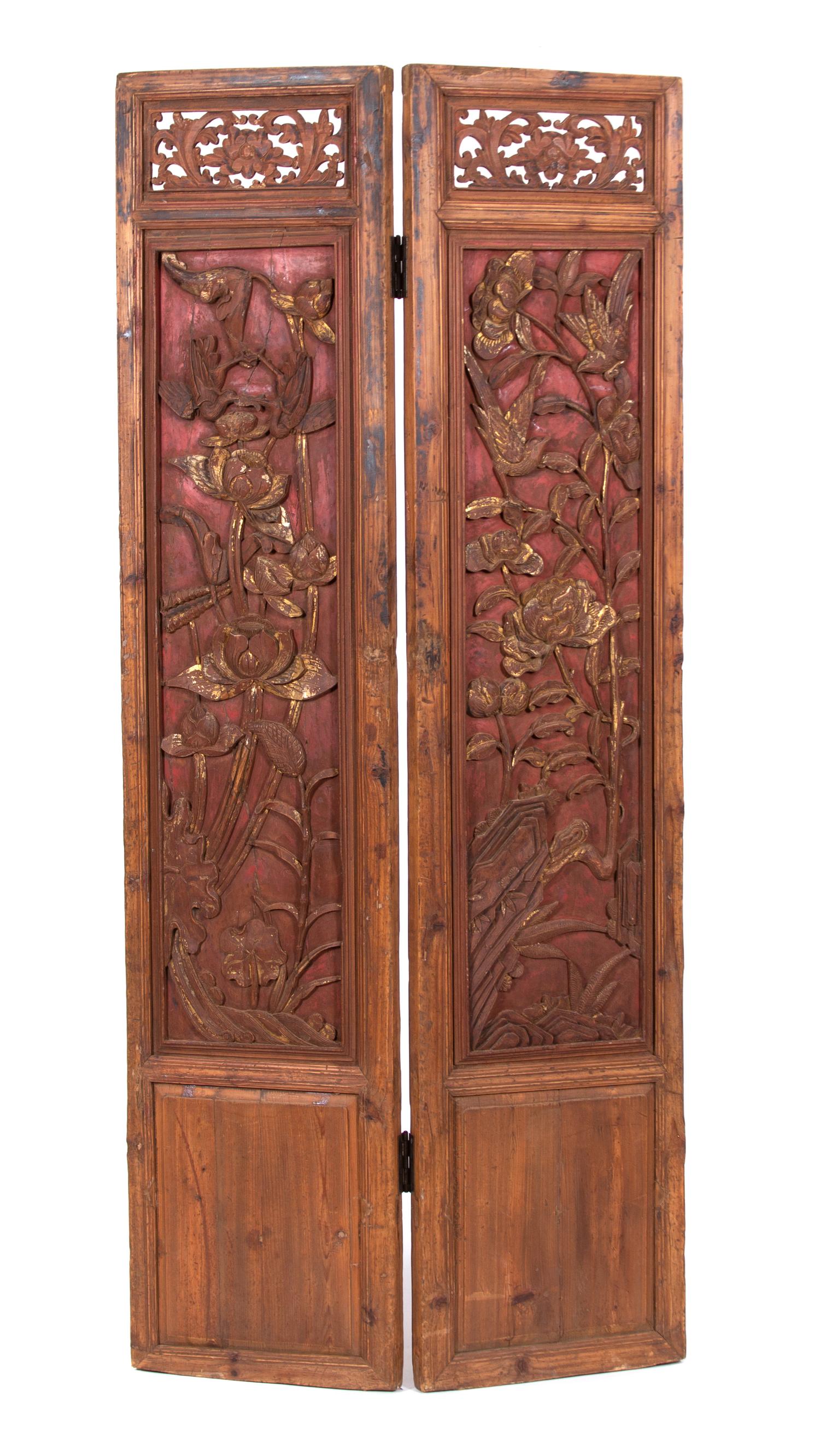 An Asian Carved Pine and Red Lacquer Two Panel Screen Each panel, height 83 x width 18 inches. — 20TH CENTURY
