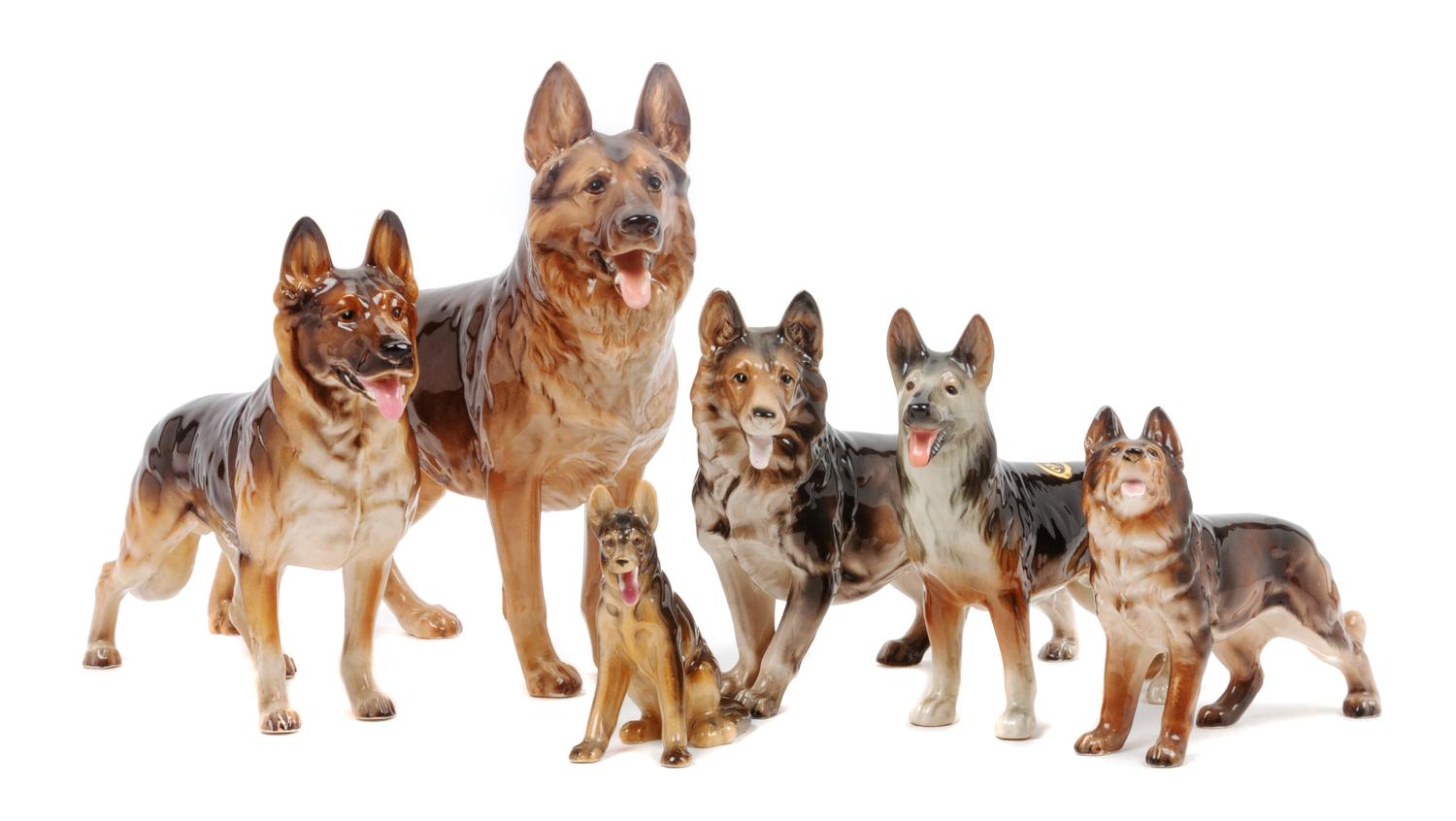 A Group of Six Porcelain German Shepherds Width of widest 12 inches.