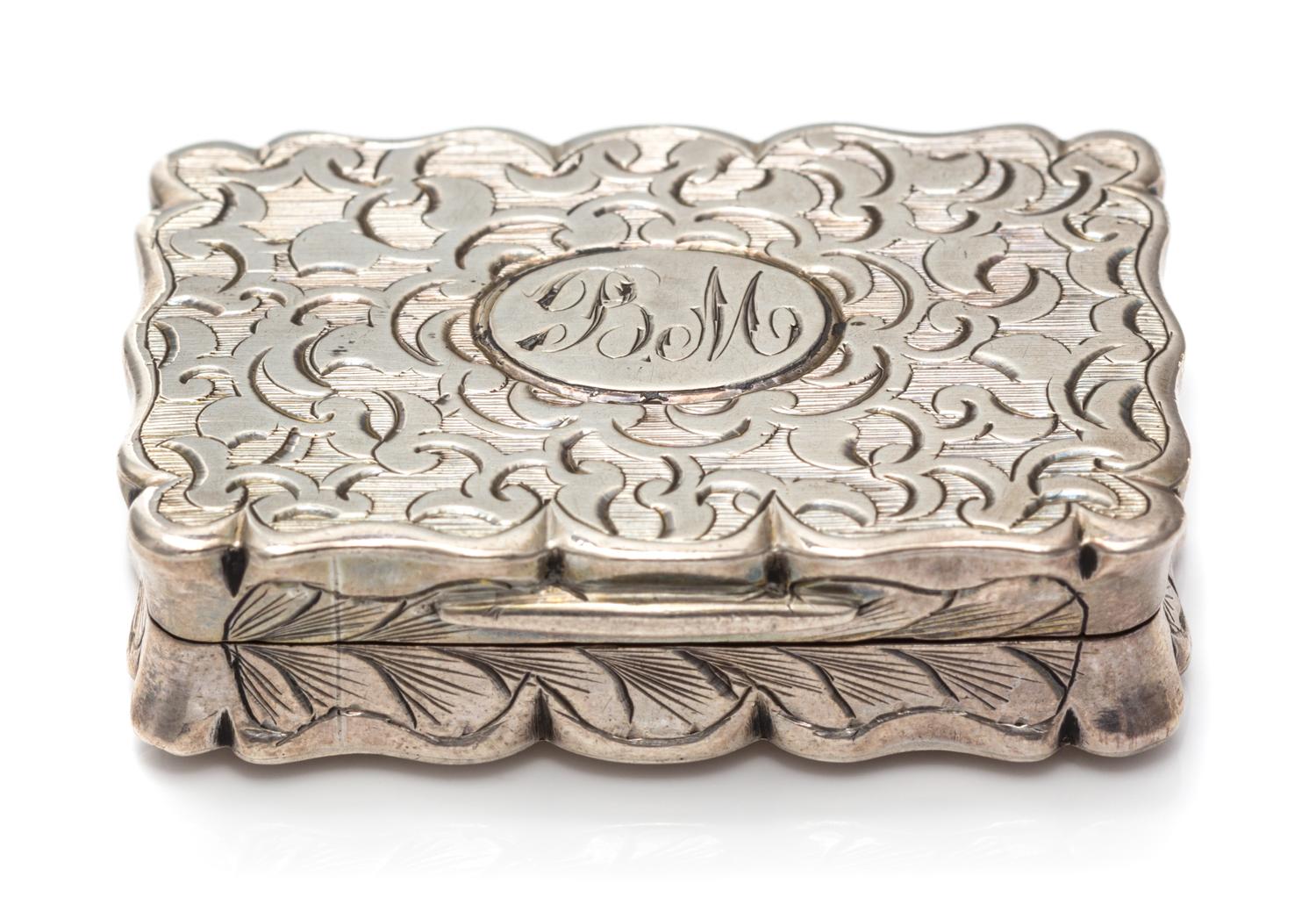 A Victorian Silver Vinaigrette, Frederick Marson, Birmingham, 1857, the case worked with floral decoration, the lid centered by a monog