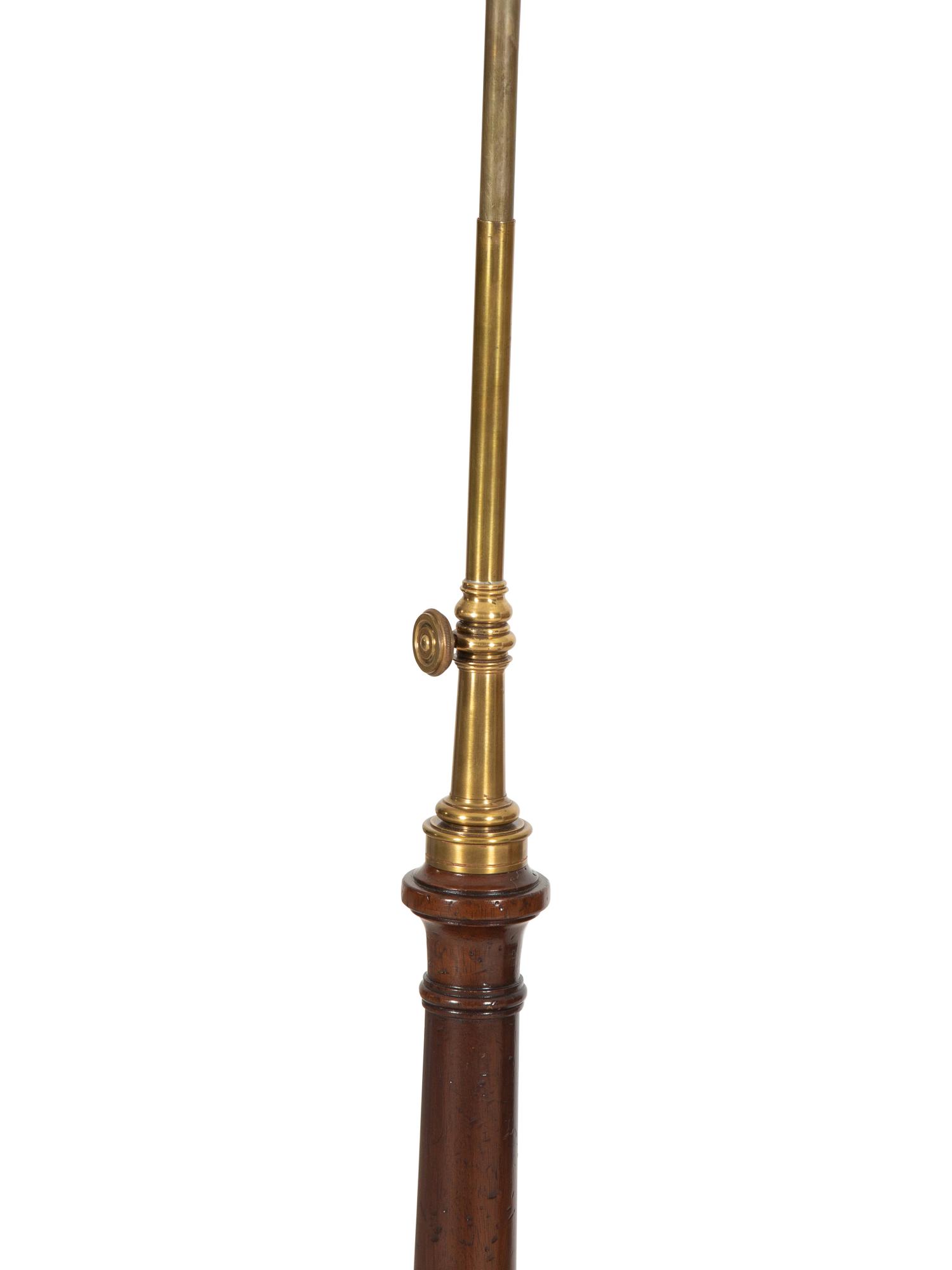 A Mahogany Two Light Floor Lamp with Table Shelf and a Jardinière Stand