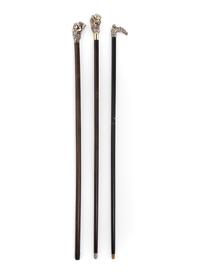 A Group of Three Silver Mounted Figural Walking Sticks