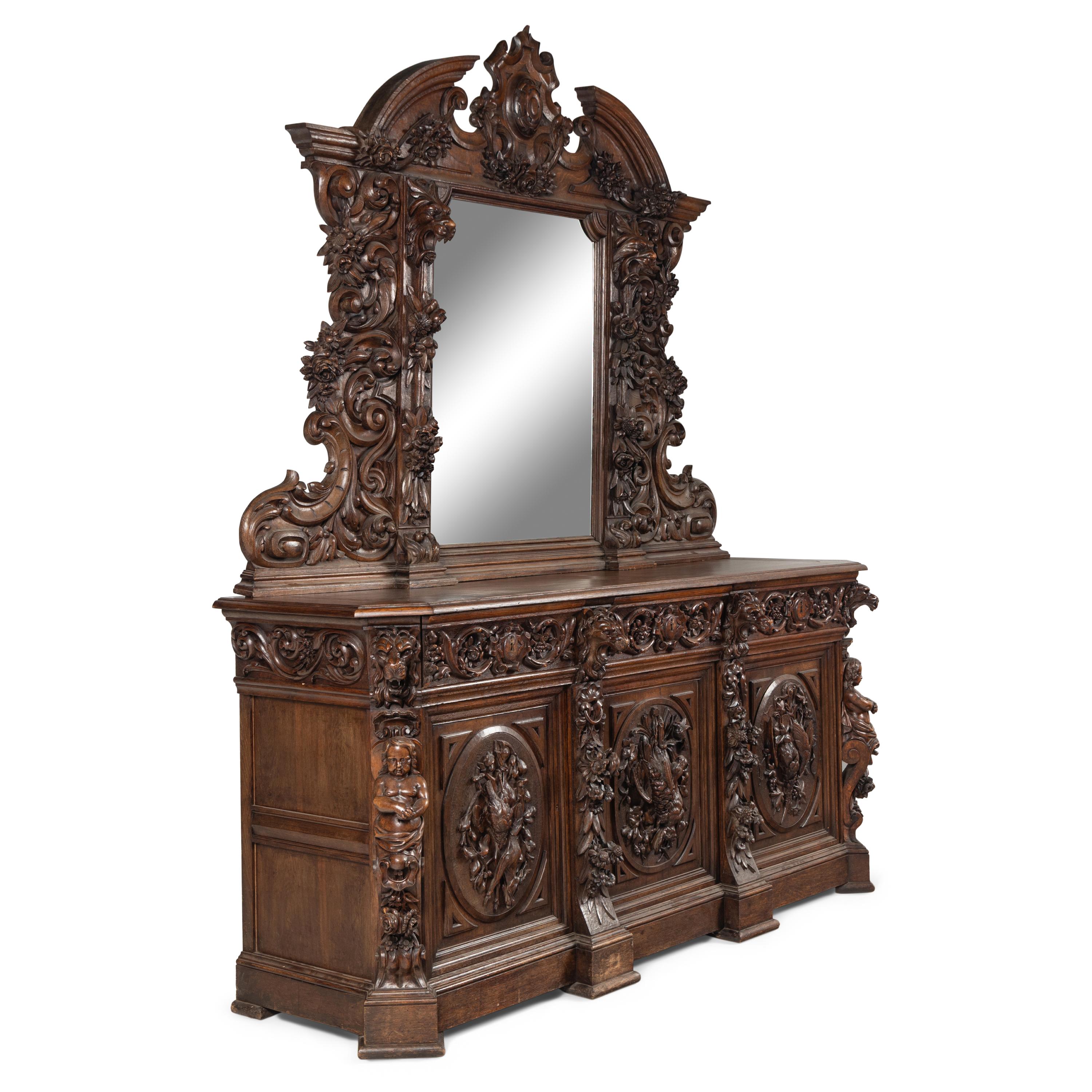 A French Carved Walnut Buffet à Deux Corps