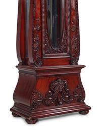 A Herschede Carved Mahogany Nine-Tube Tall Case Clock