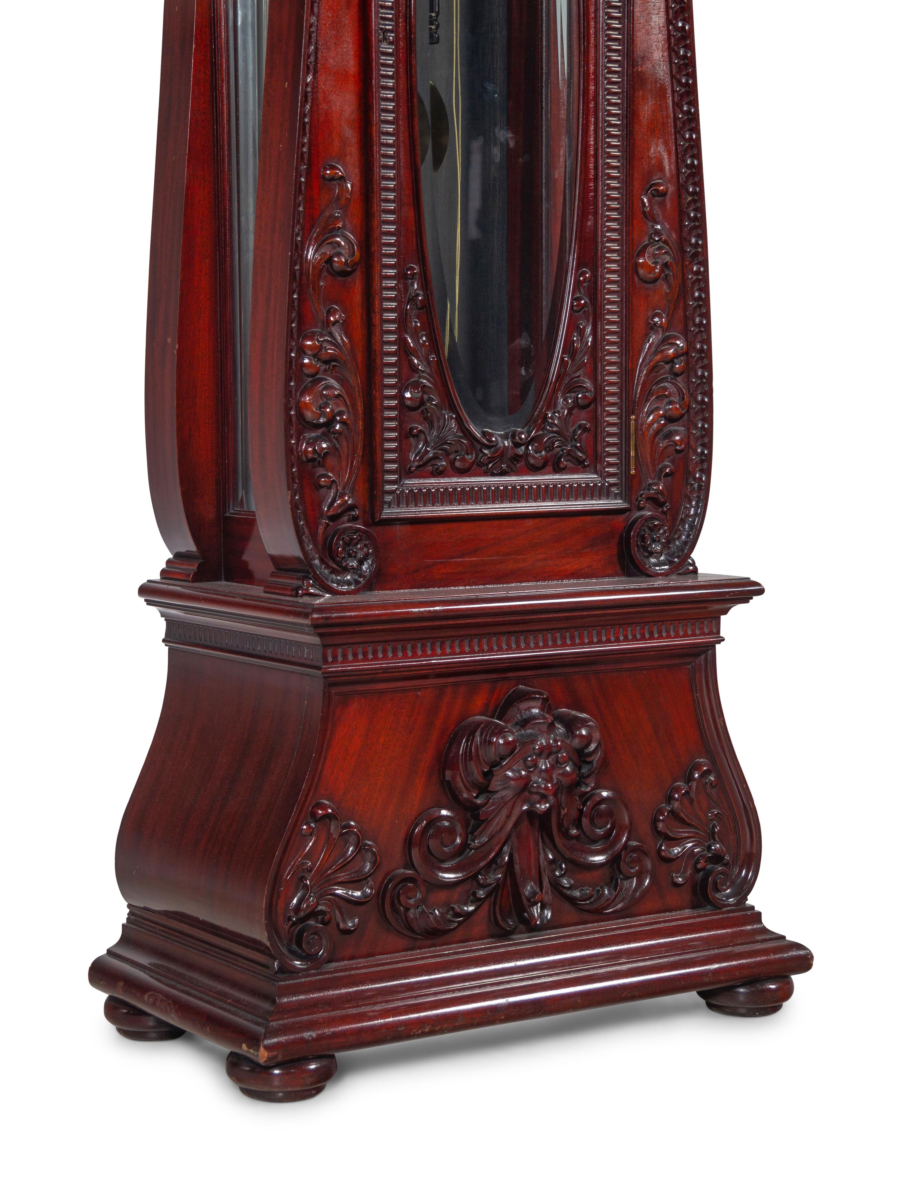 A Herschede Carved Mahogany Nine-Tube Tall Case Clock