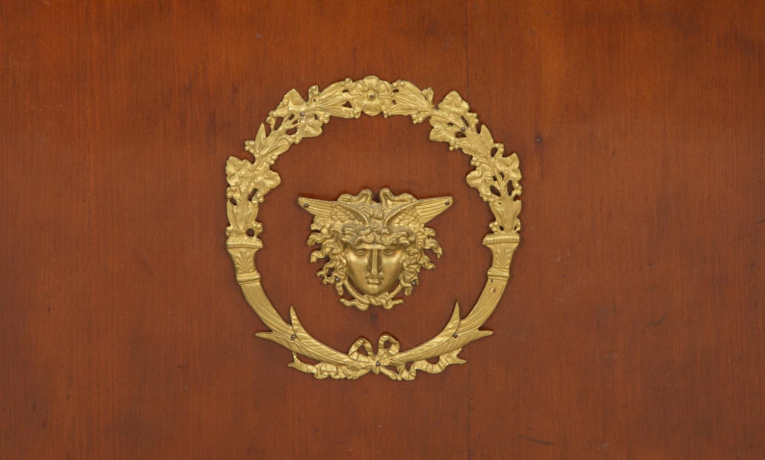 An Empire Style Gilt Metal Mounted Mahogany Bibliothèque