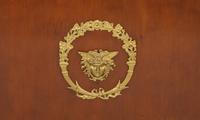An Empire Style Gilt Metal Mounted Mahogany Bibliothèque