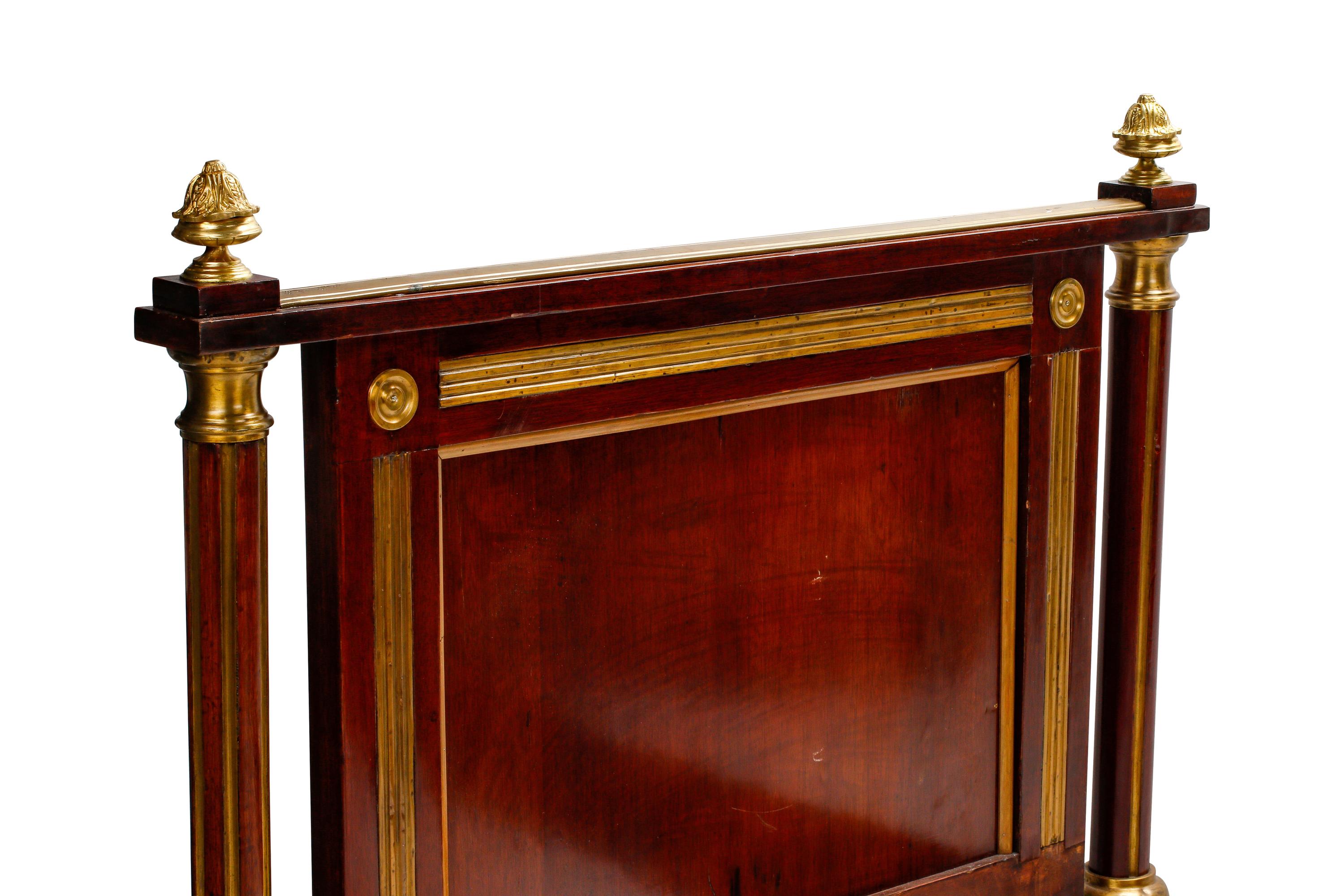 A Russian or Baltic Neoclassical Gilt Bronze Mounted Mahogany Bed