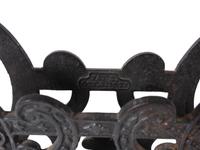 A Cast Iron Lyre Form Music Stand