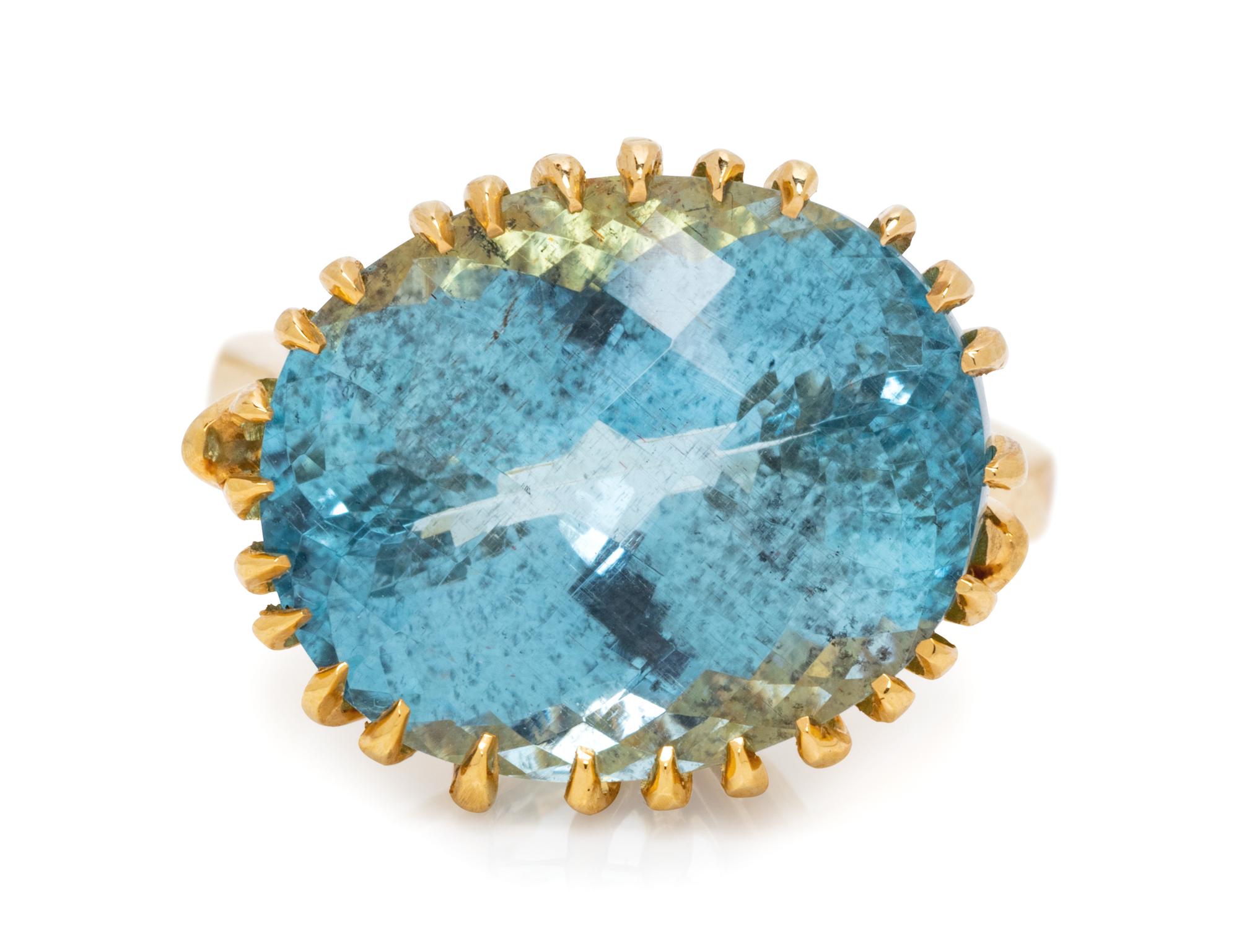A 14 Karat Yellow Gold and Aquamarine Ring, Remue,