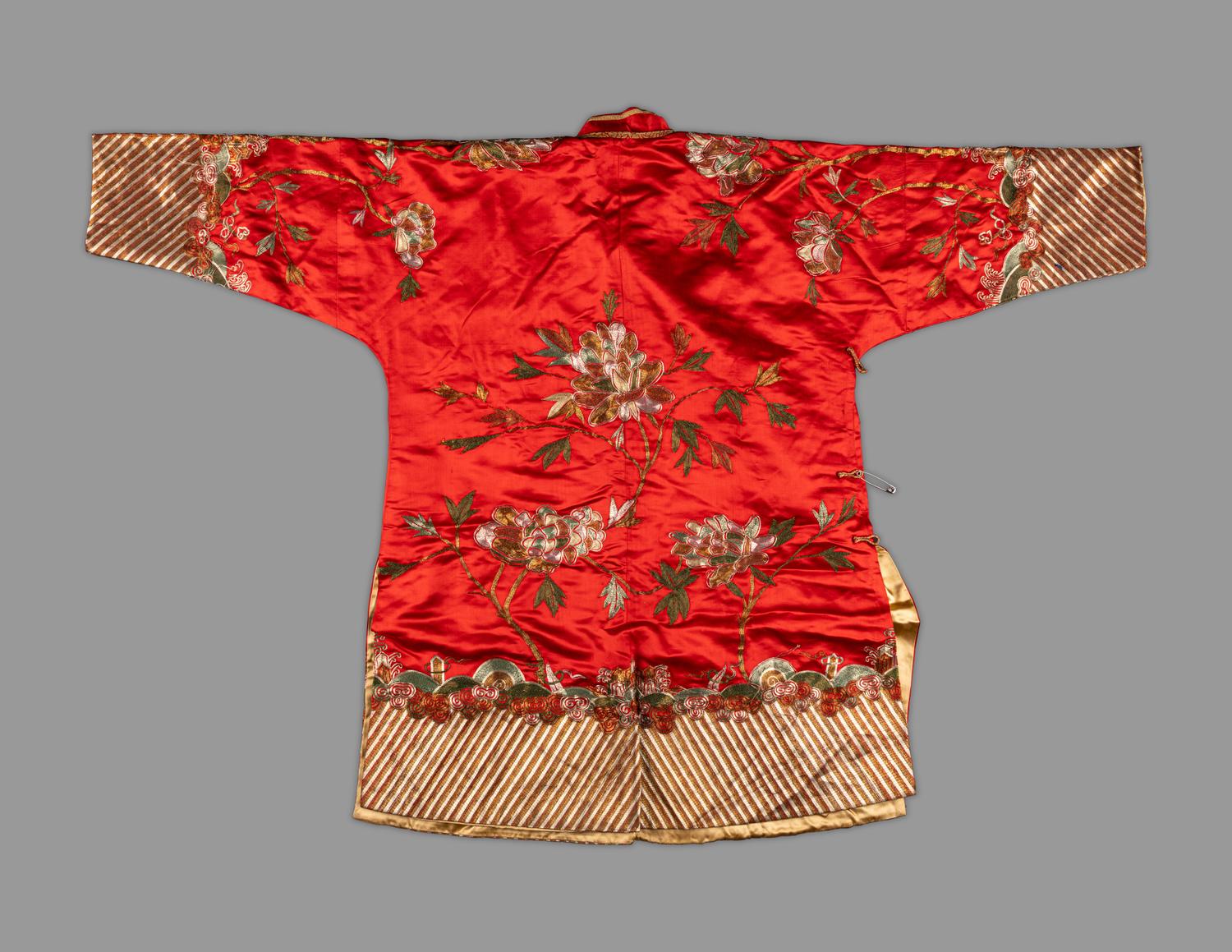 A Chinese Red Ground Embroidered Silk Jacket