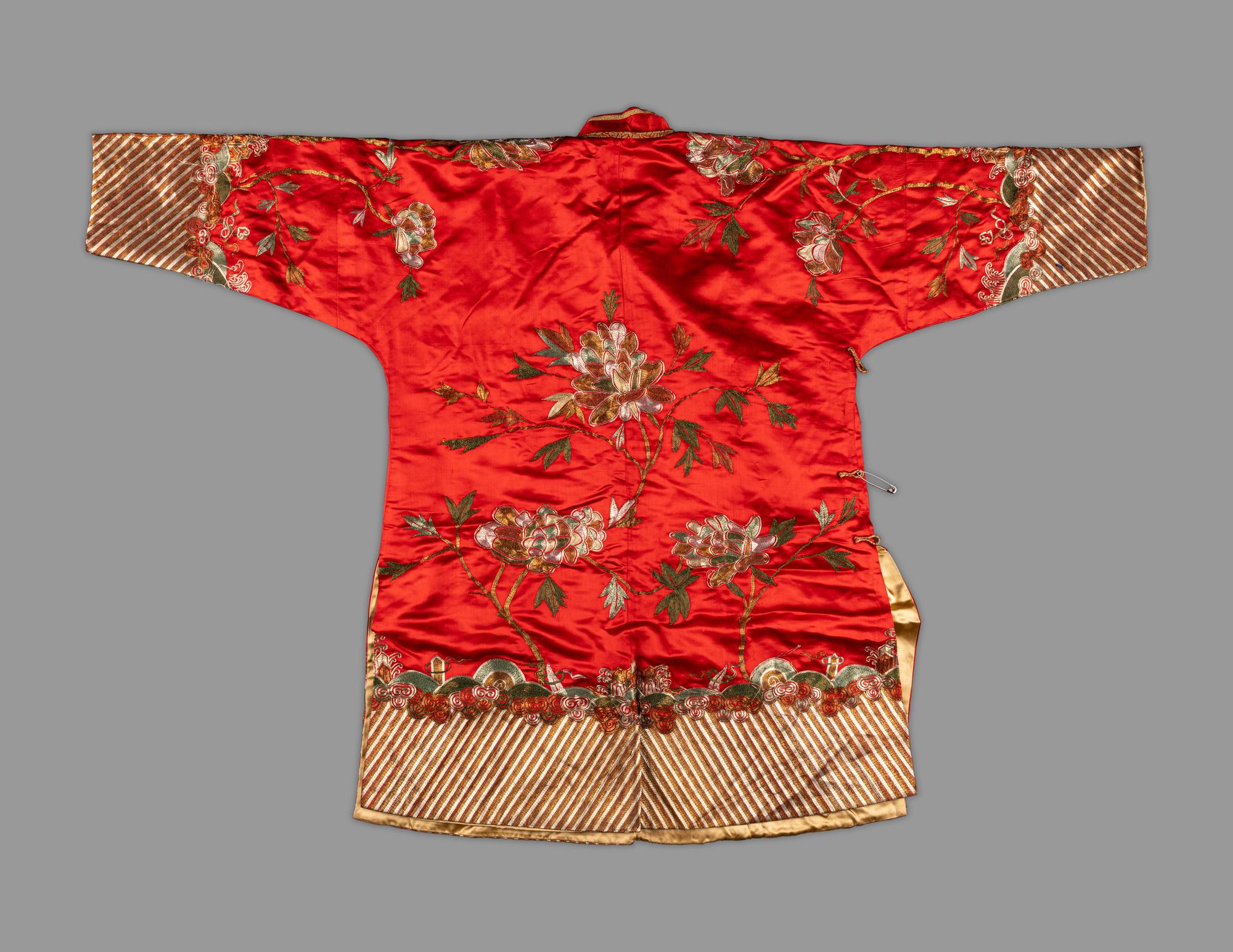 A Chinese Red Ground Embroidered Silk Jacket