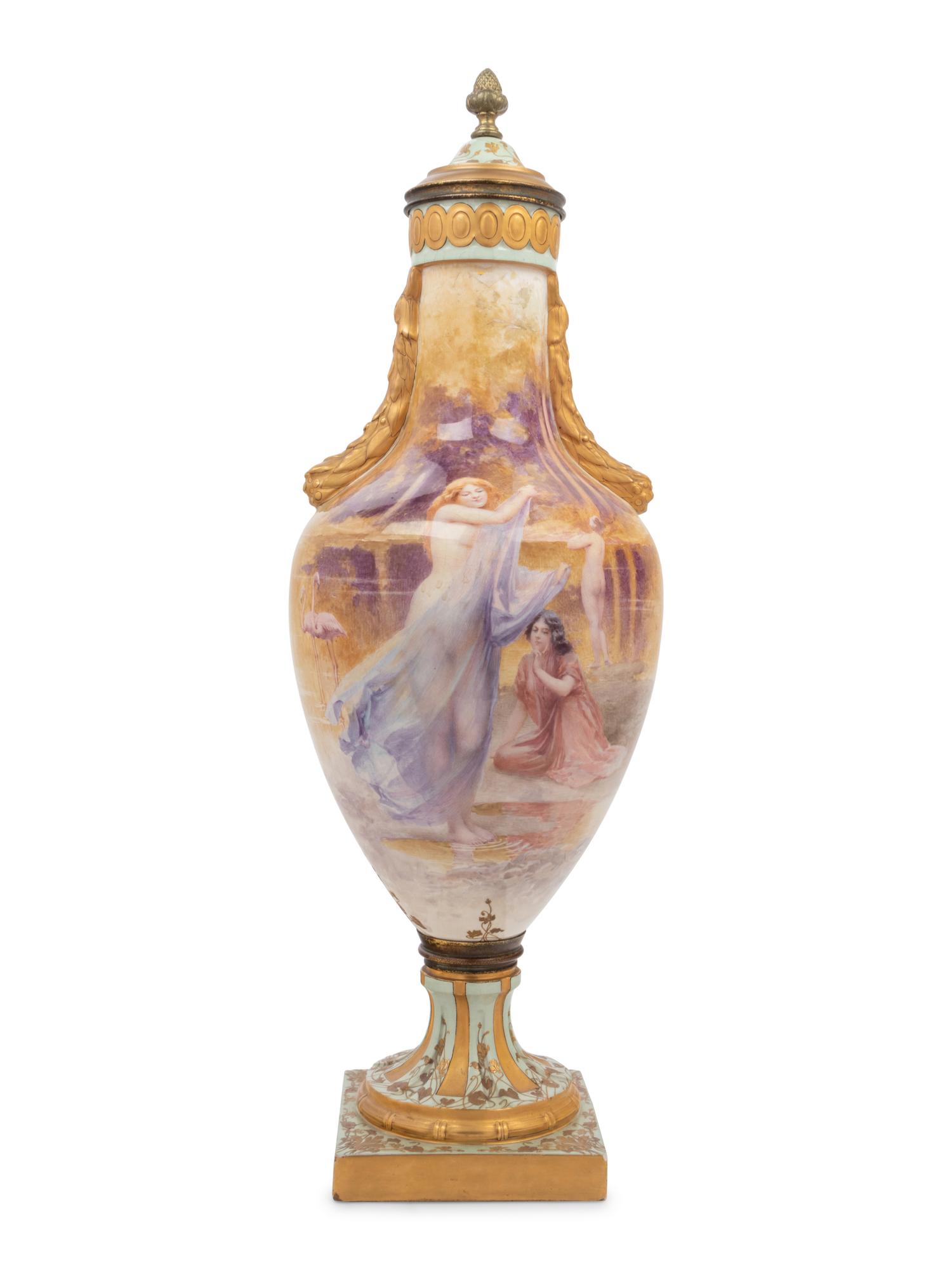 A French Painted and Parcel Gilt Porcelain Urn