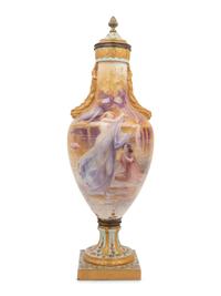 A French Painted and Parcel Gilt Porcelain Urn