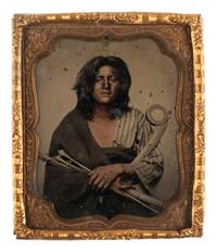 [NATIVE AMERICANS]. Sixth plate tintype of a young Native American man, likely Winnebago, posed with a war club and bird arrows. Ca 1865.