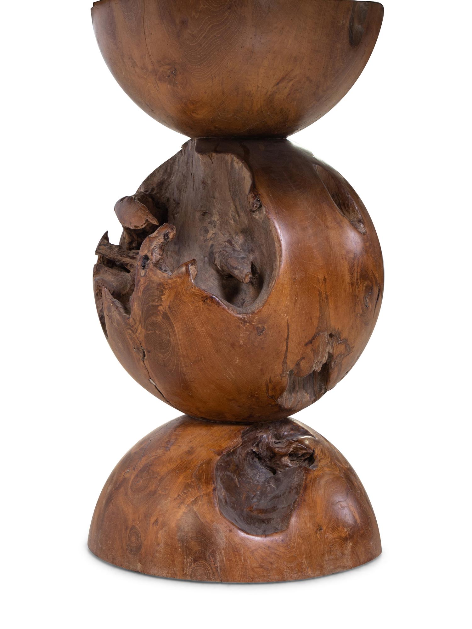A Contemporary Cast Metal and Burlwood Center Table