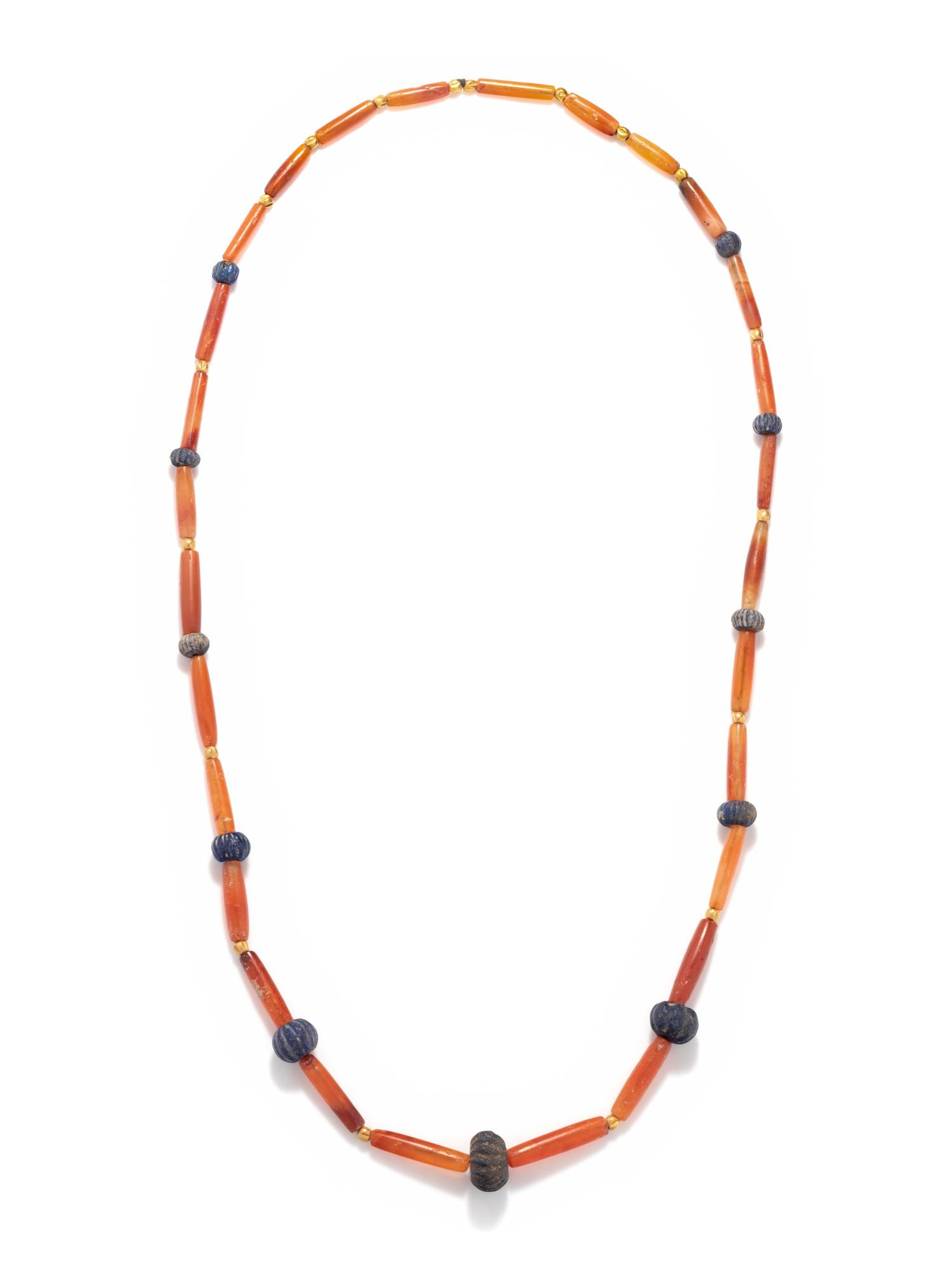 A Sumerian Lapis Lazuli, Carnelian, and Gold Bead Necklace