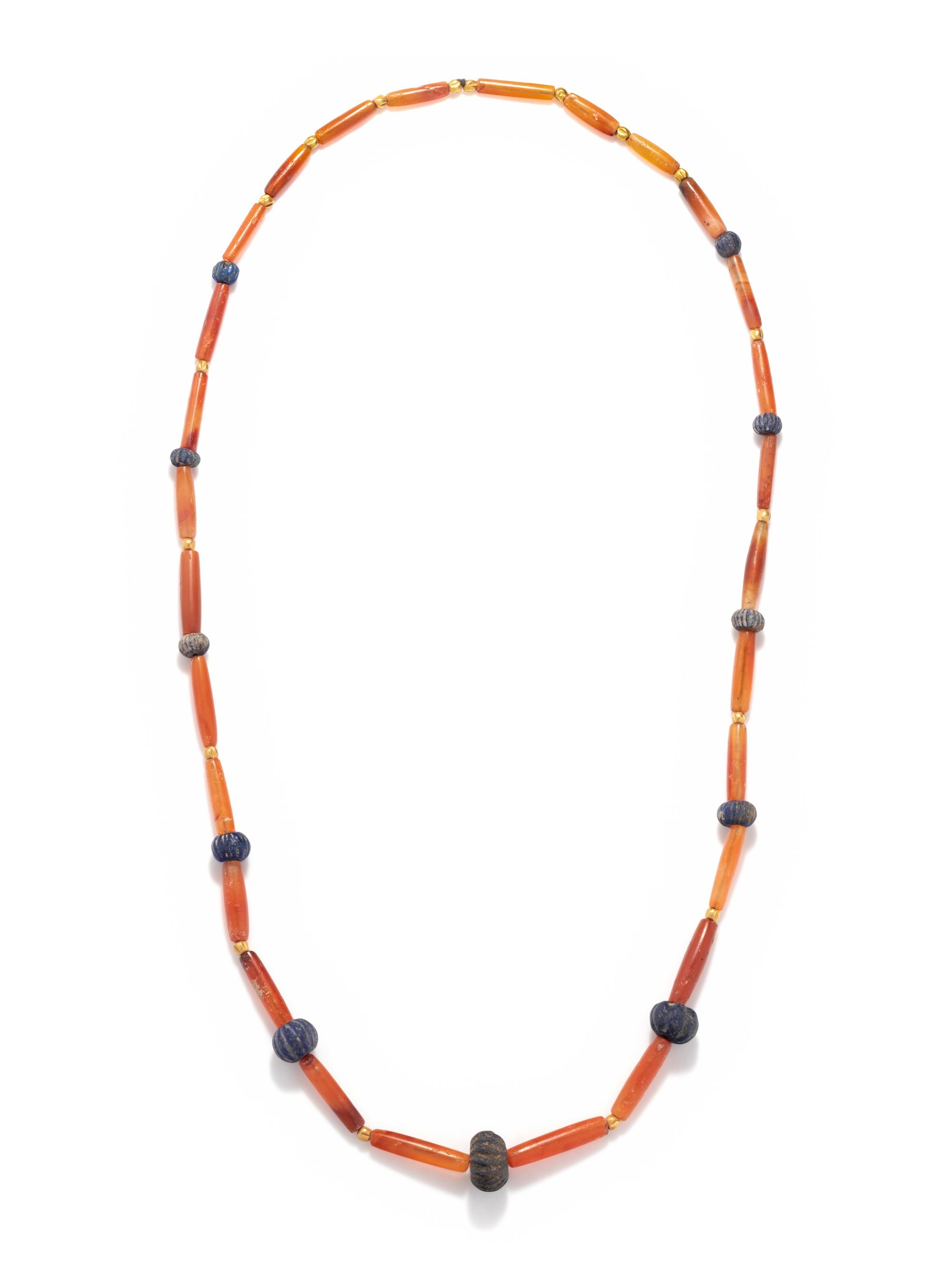 A Sumerian Lapis Lazuli, Carnelian, and Gold Bead Necklace