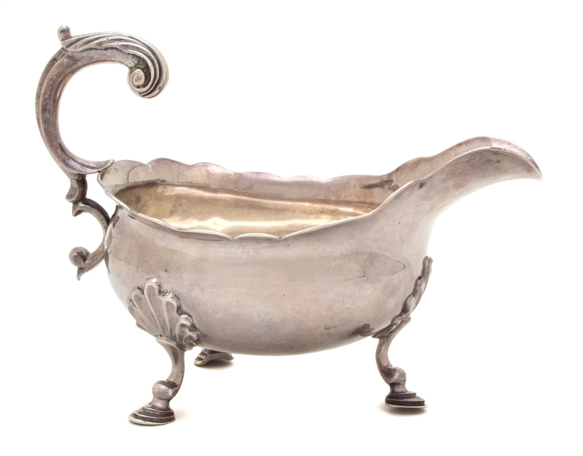 A George I Silver Sauceboat, Possibly William Bateman, London, 1820, having a scalloped edge
