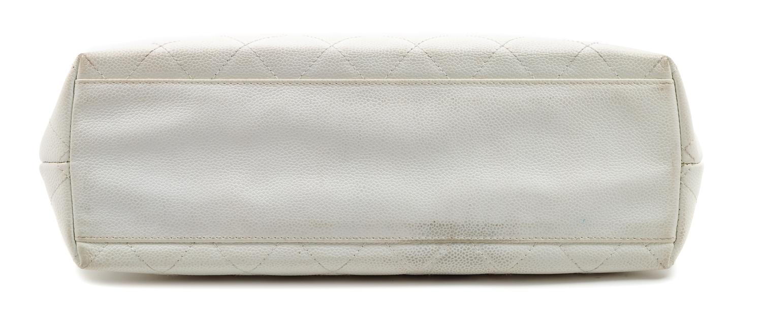 A Chanel White Caviar Quilted Melrose Cabas Wood Handle Bag, 10.5" H x 13.5" W x 4.5" D; Handle drop: 2".