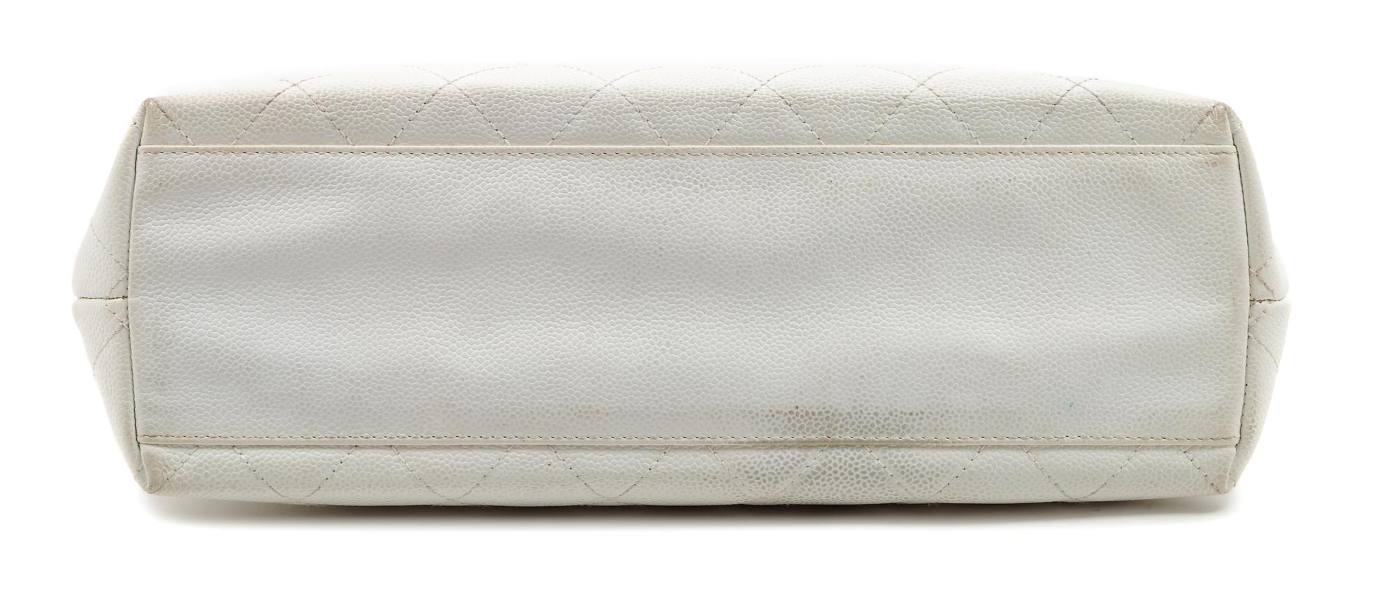 A Chanel White Caviar Quilted Melrose Cabas Wood Handle Bag, 10.5" H x 13.5" W x 4.5" D; Handle drop: 2".