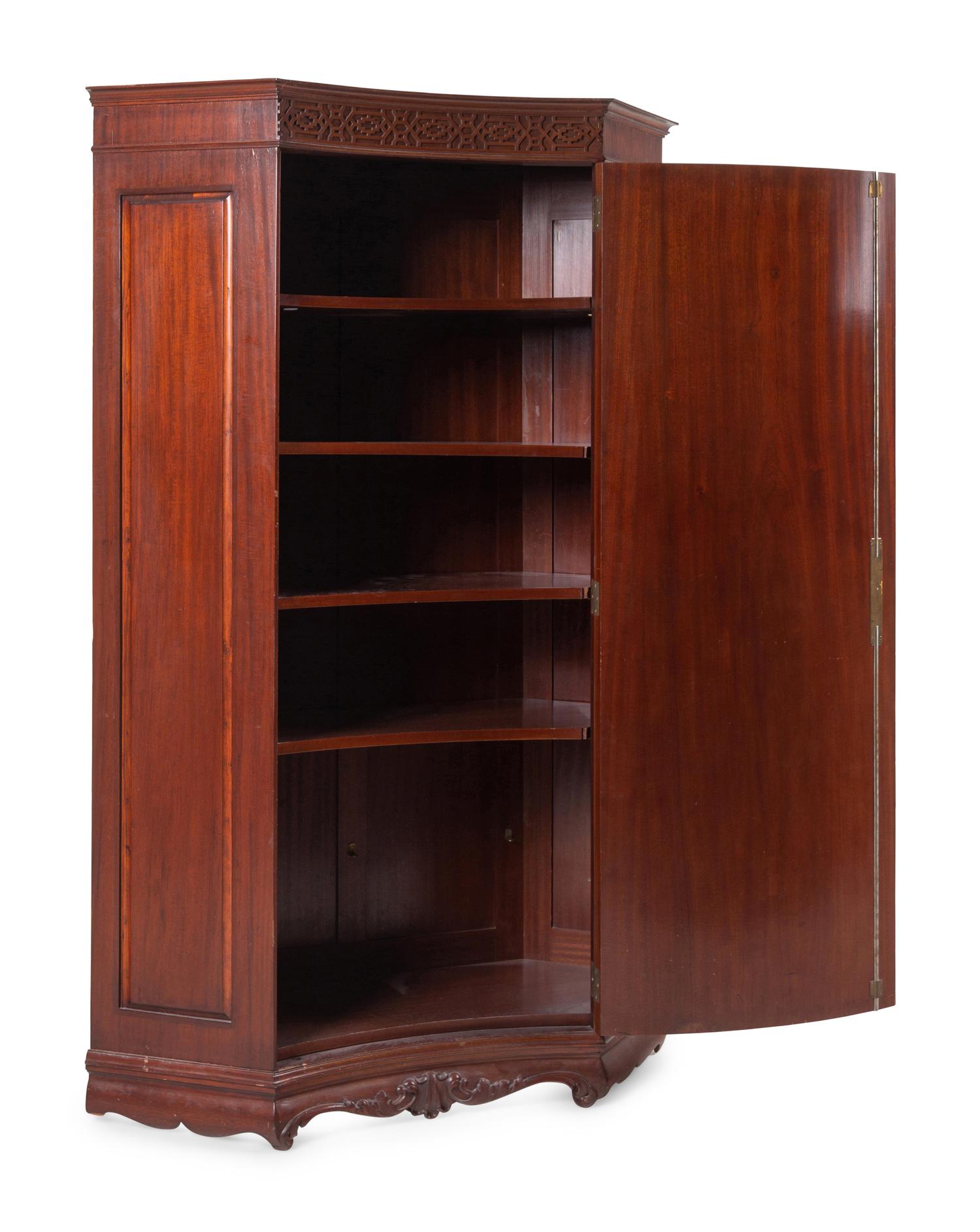 A George III Style Mahogany Corner Cabinet in the Chippendale Taste