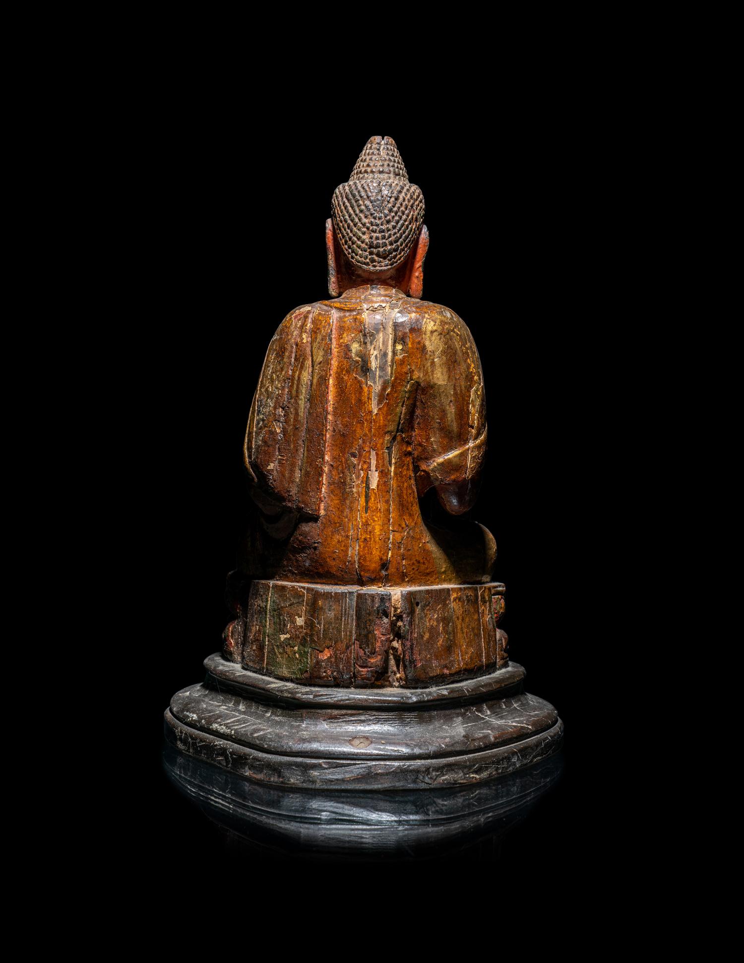 A Chinese Carved Wood Figure of Buddha Shakyamuni