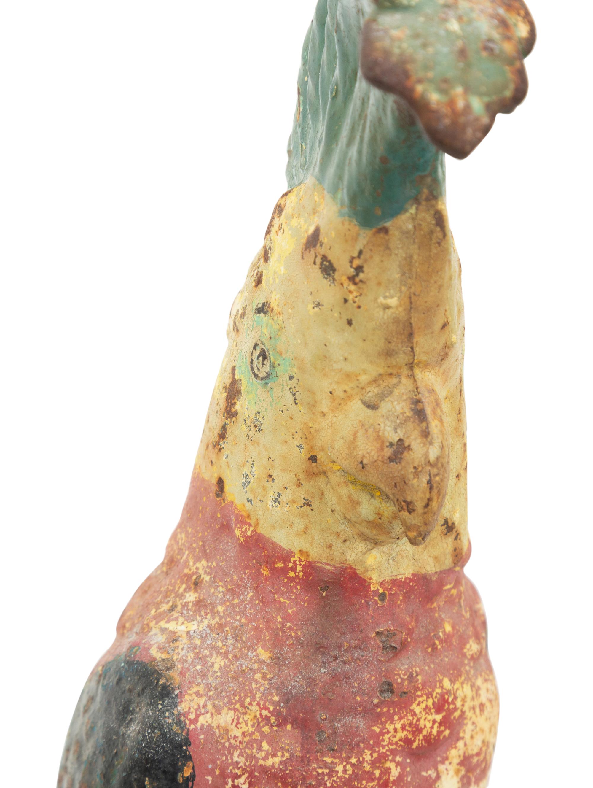 A Pair of Polychrome Painted Iron Parrots