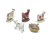 Three Staffordshire Cow-Form Creamers and a Quail-Form Covered Tureen